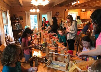 Weaving with young campers