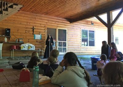 Camp directoress addresses campers