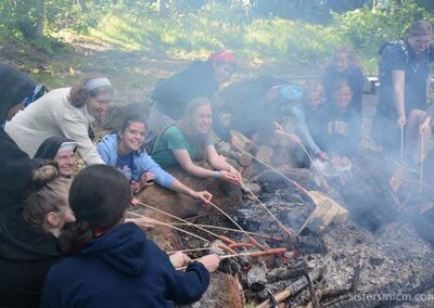 Hot dog roast over fire