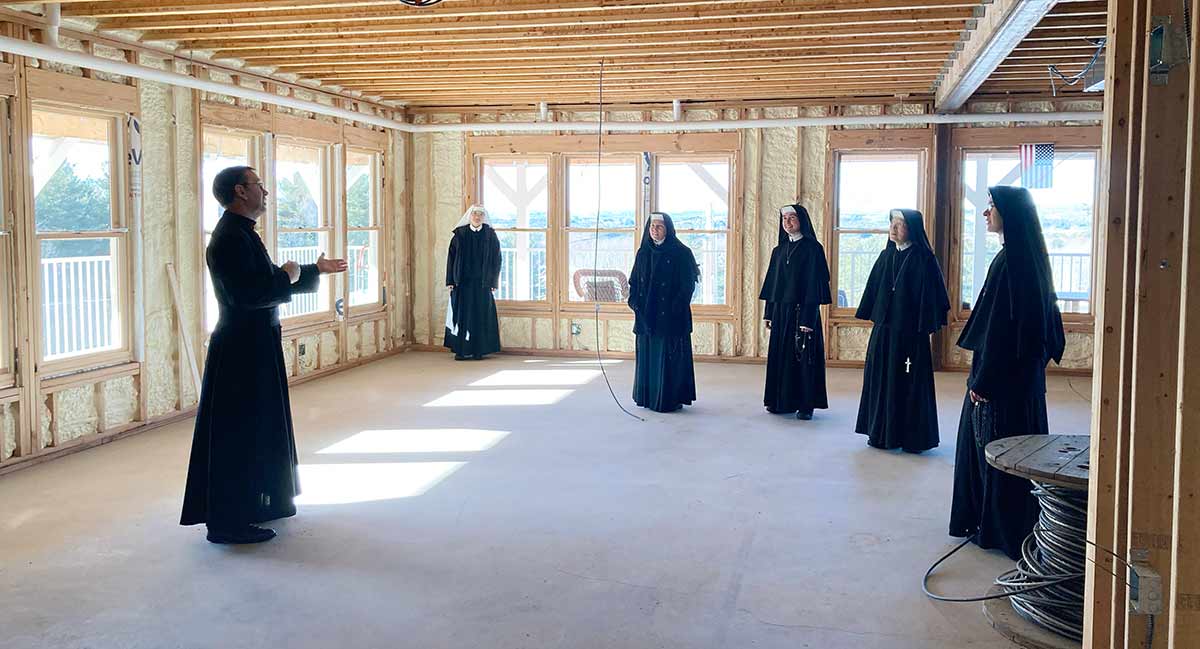 Sisters tour the IHM Expansion construction.