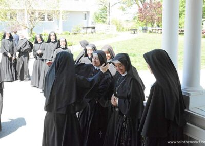Sisters MICM congratulate the newly professed Sister Mary Anne.