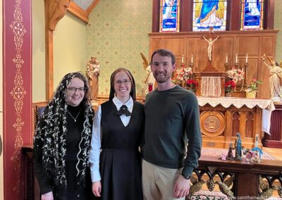 Postulant Madeleine with her brother and a friend.