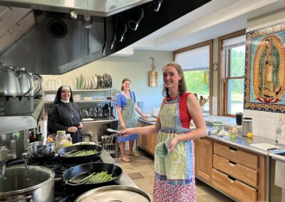 Counselors cook us dinner for July 4.
