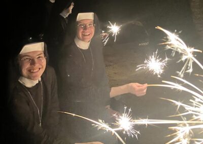 Festive sisters with sparklers