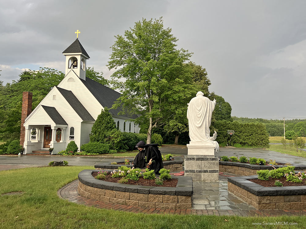 Keeping up on the Saint Louis Marie Shrine Sister weeds Saint Louis Marie Shrine at Saint Benedict Center