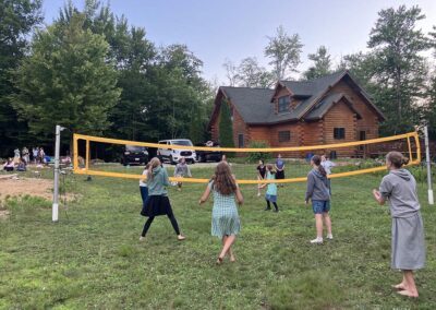 Morning Star Camp 2026 volleyball by the lodge