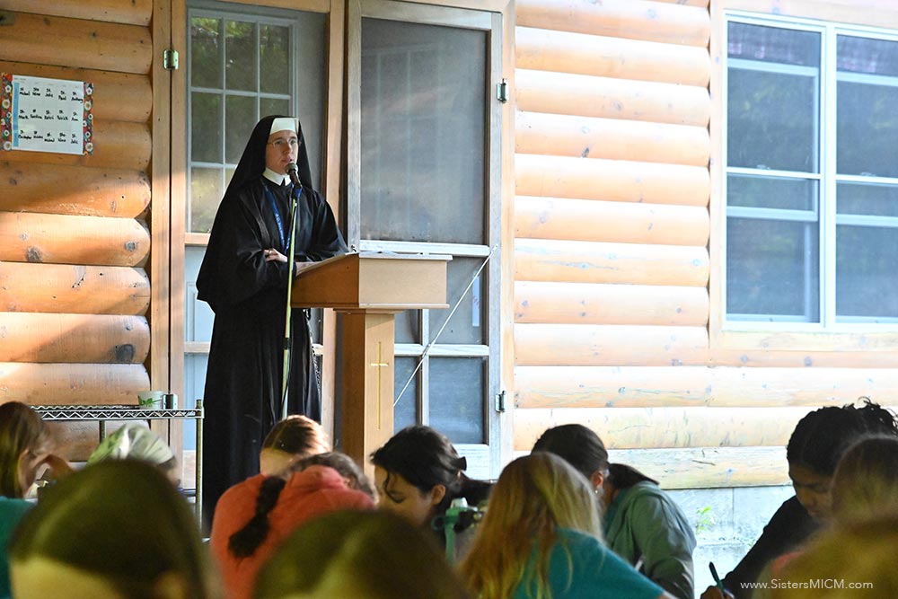 Camp directoress Sister gives a leadership skills talk to campers.