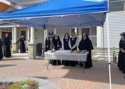 Postulants cut the cake, September 8, 2026