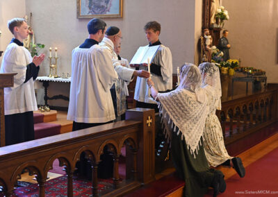Postulants receive the light of Christ, September 8, 2026