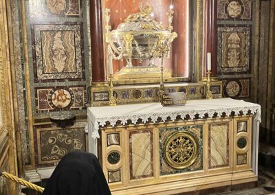 Sisters Kneeling at the Crib in Saint Mary Major.